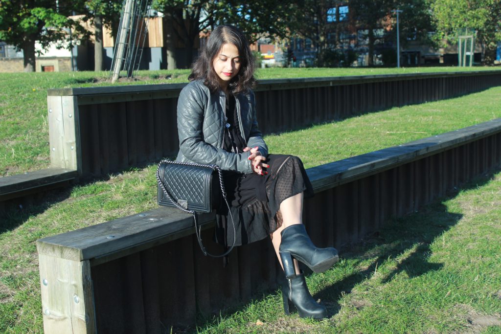 Bohemian black maxi dress and boy Chanel