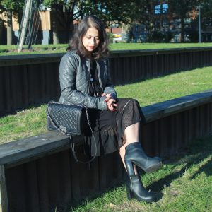 Bohemian black maxi dress and boy Chanel