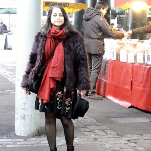 Fur jacket and black dress
