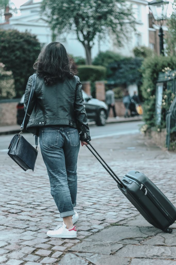 Airport Outfits - Organic Basics white tee boyfriend jeans Gucci belt