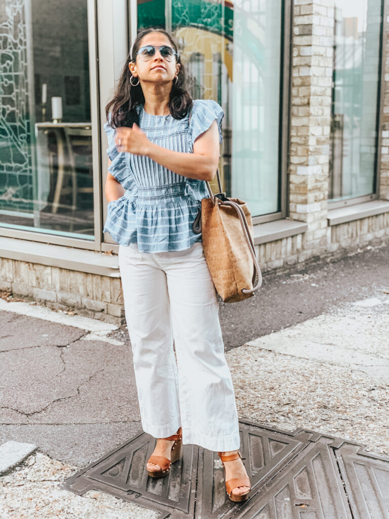 Lostock Box - blue frilly top and white jeans