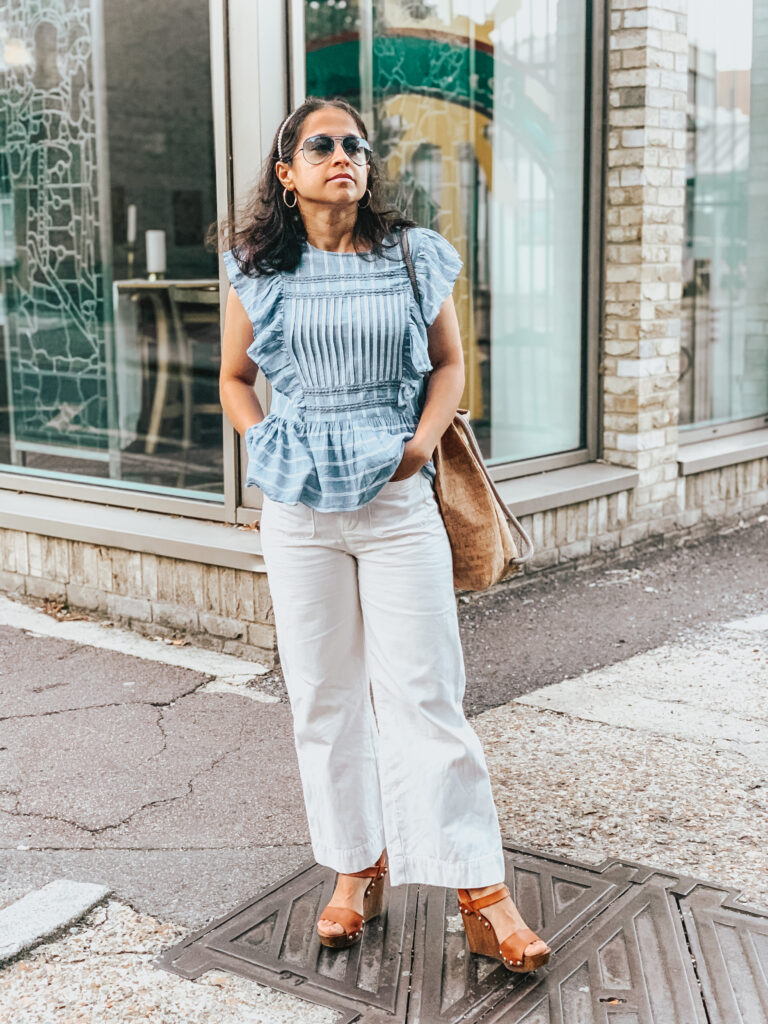 Lost Stock Box - blue frilly top and white jeans