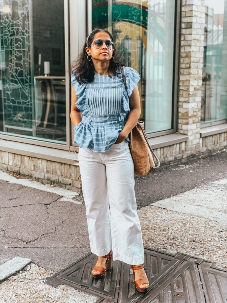Lost Stock Box - blue frilly top and white jeans