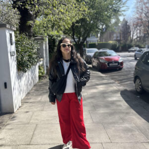 red track pants, leather jacket